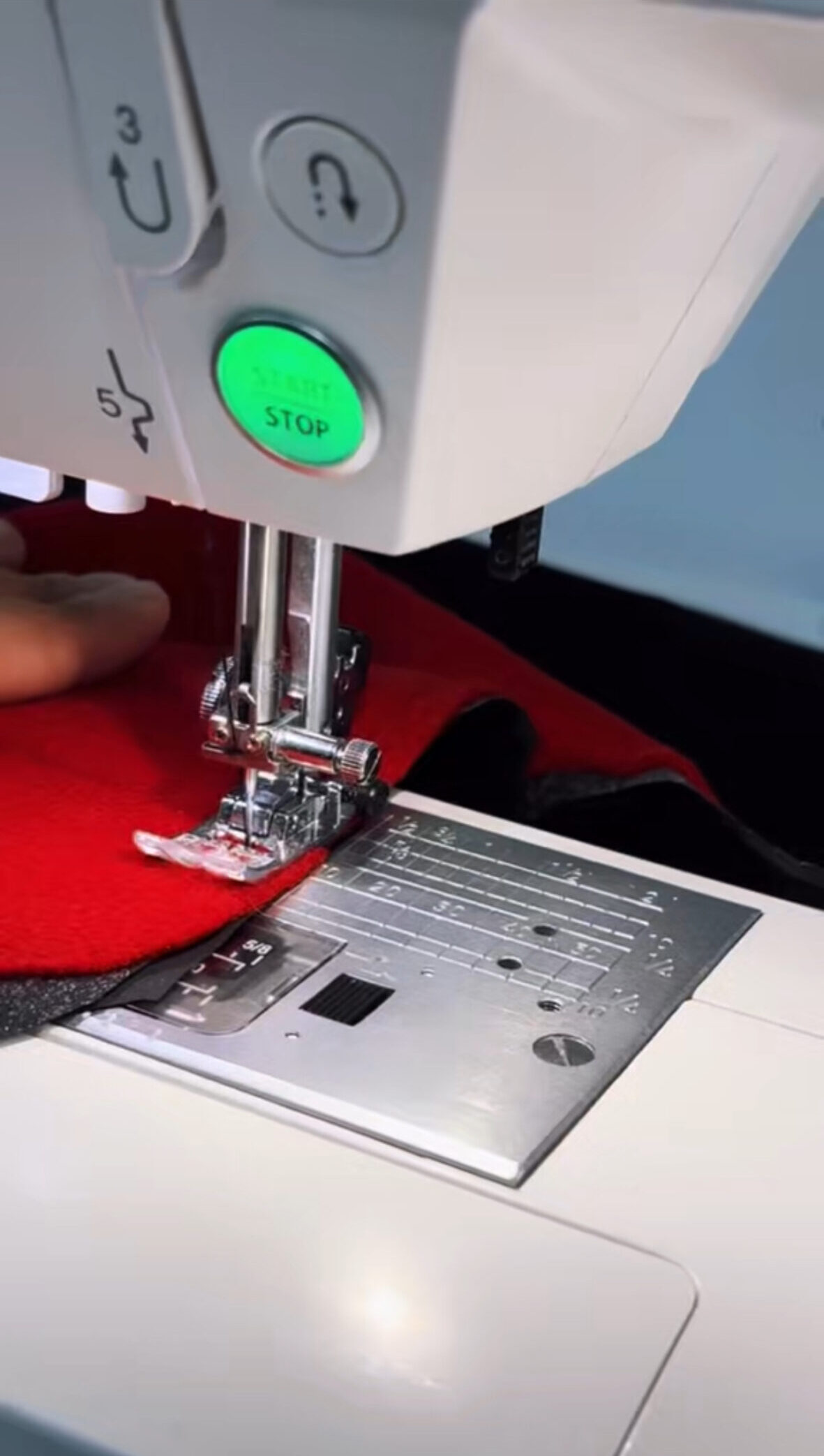 PrivateLessons Image of sewing machine close up.